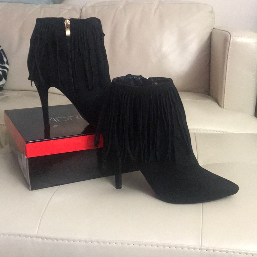 Adriana Shana high heeled fringe booties
